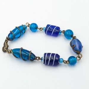Vintage blue glass wire wrapped bracelet